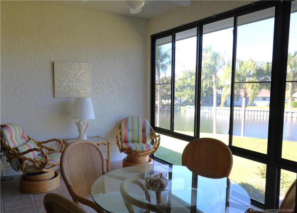 Roomy lanai with enclosed windows and screens