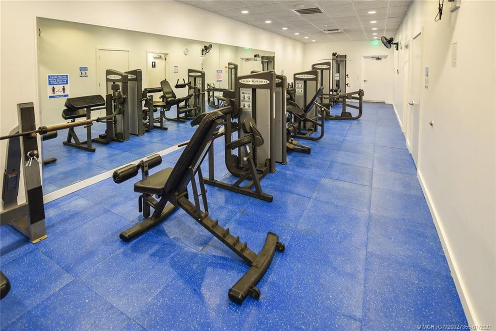 Fitness Center With Separate Rooms For Weights and Bikes, Treadmills, Etc.