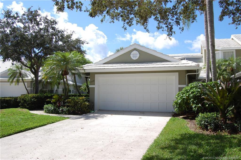 Exterior Front. One car garage with room for a golf cart.