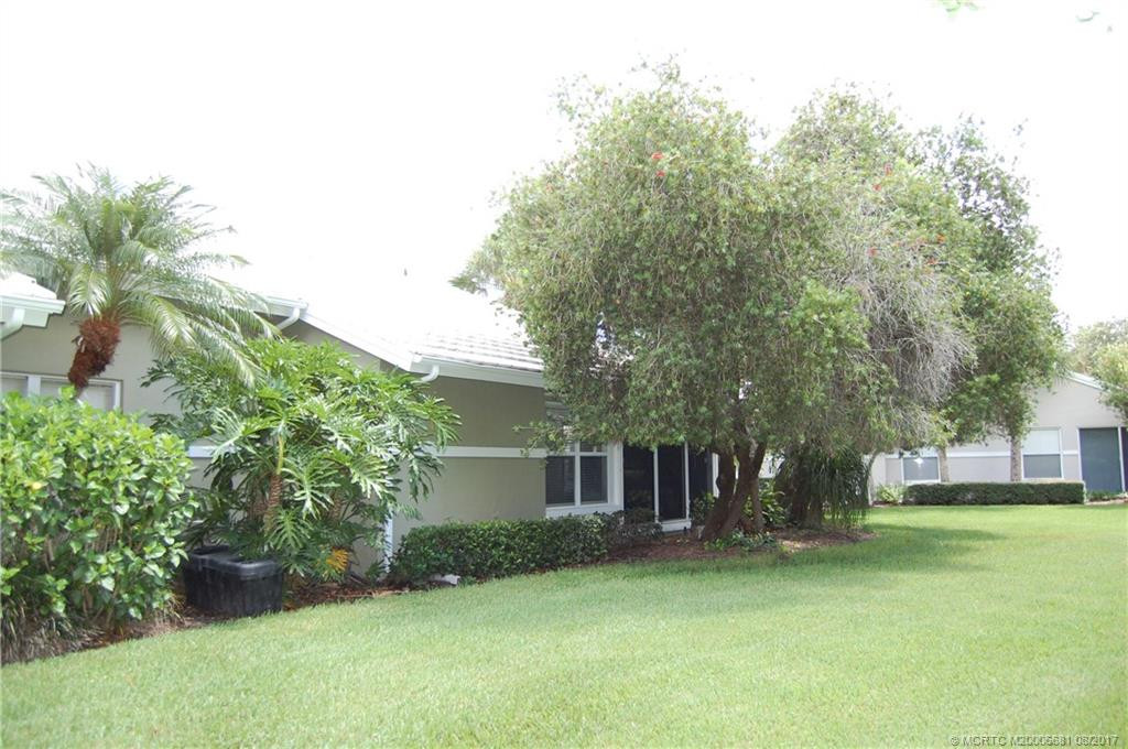 View of the back of the house. Large yard for relaxing/great for dogs!
