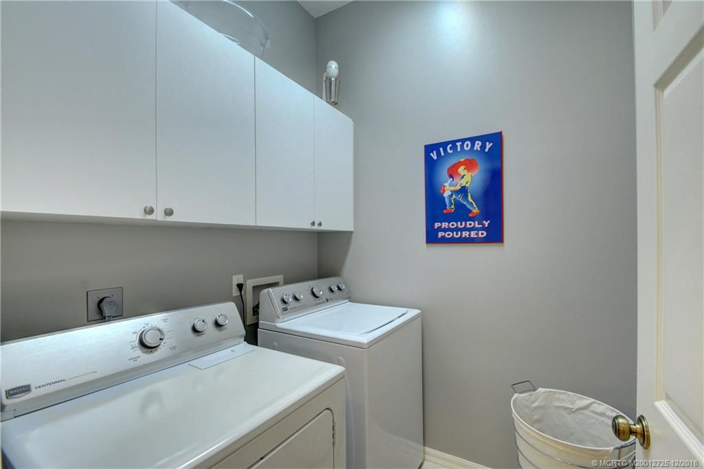 Laundry Room with Storage Cabinets