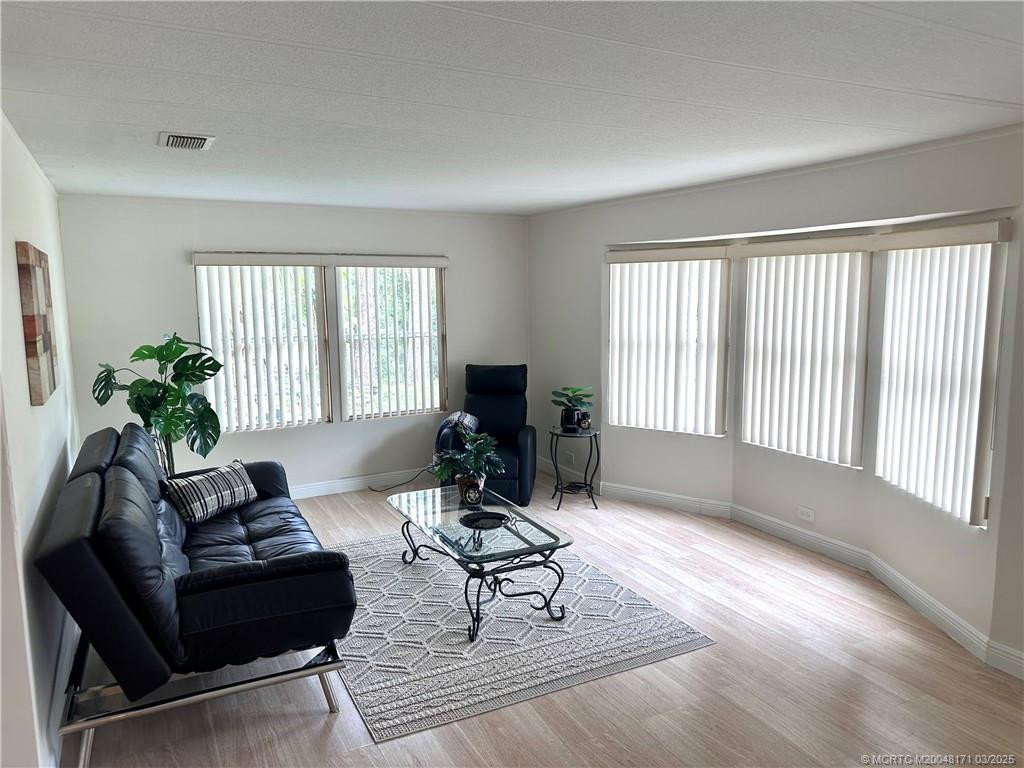 Spacious Living room with view of water