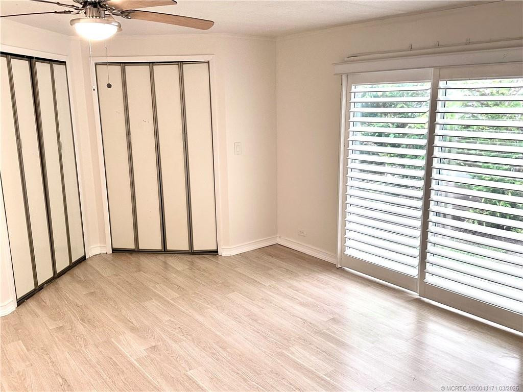 11' x 15' Bedroom w/slider, 2 Walk-in Closets