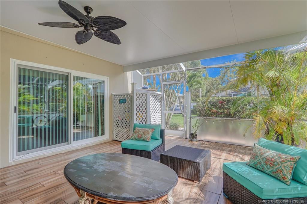 Screened, covered and tiled lanai with ceiling fans