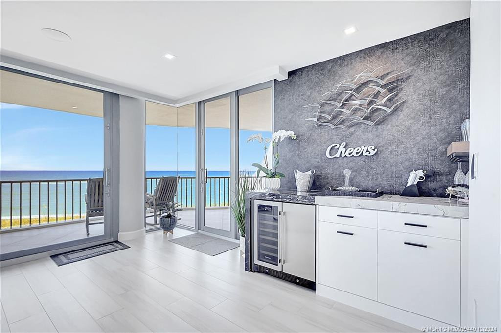 Entertainment area with Wine Enthusiast refrigerator