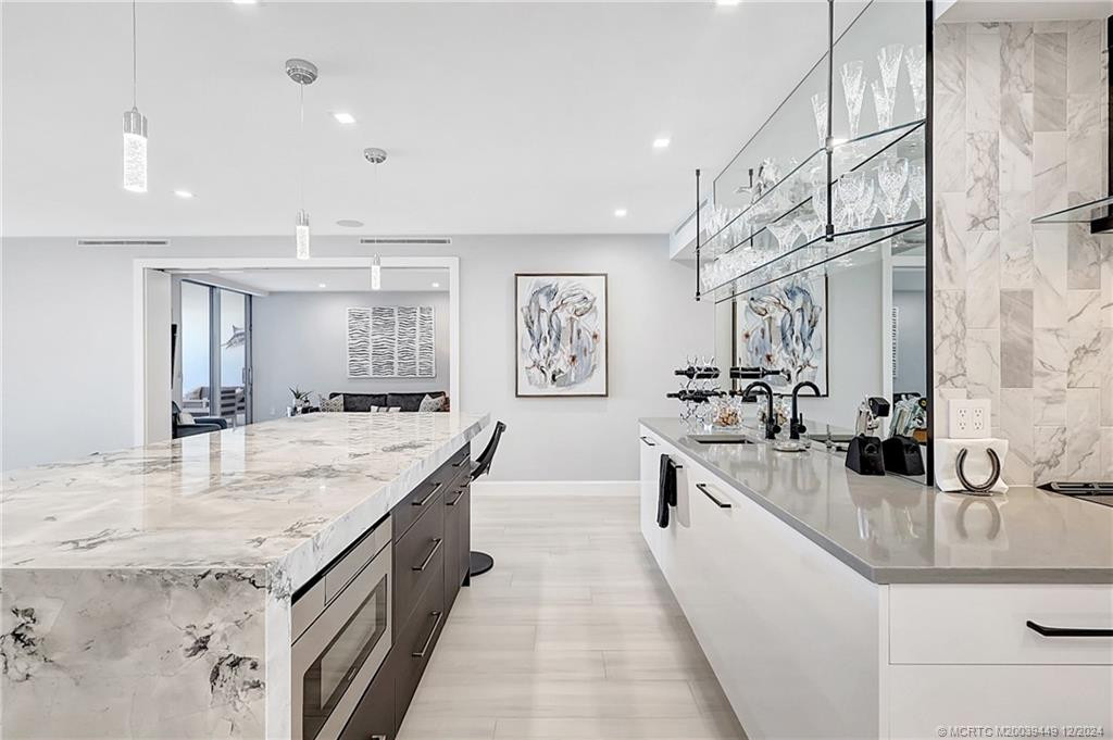 Entertainment area with sink and island