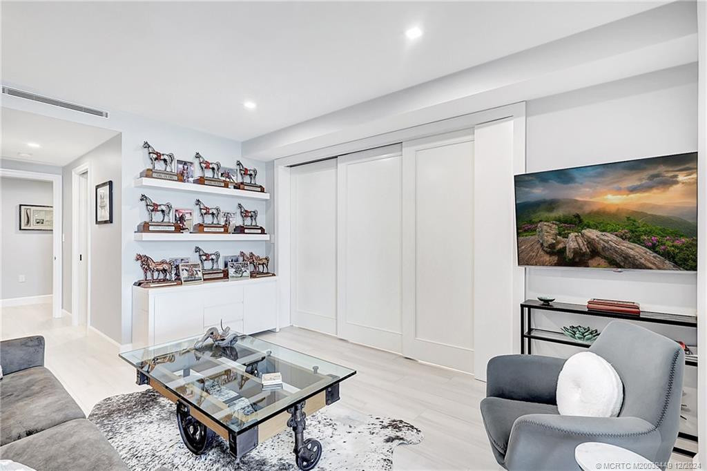 Showing the sliding wall in closed position creating a bedroom