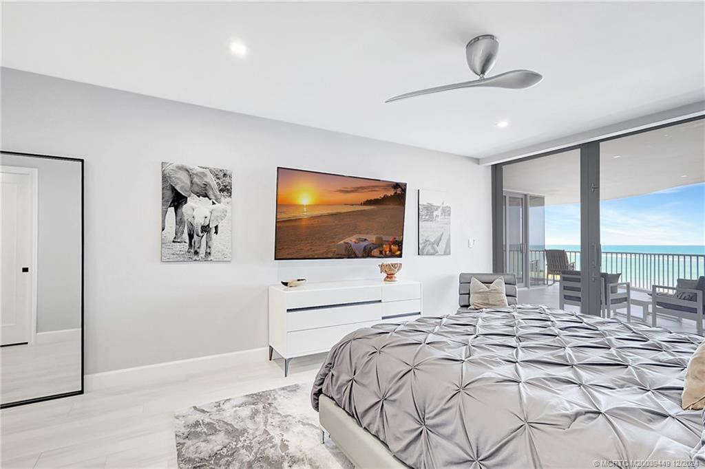 Spacious suite features electric blinds