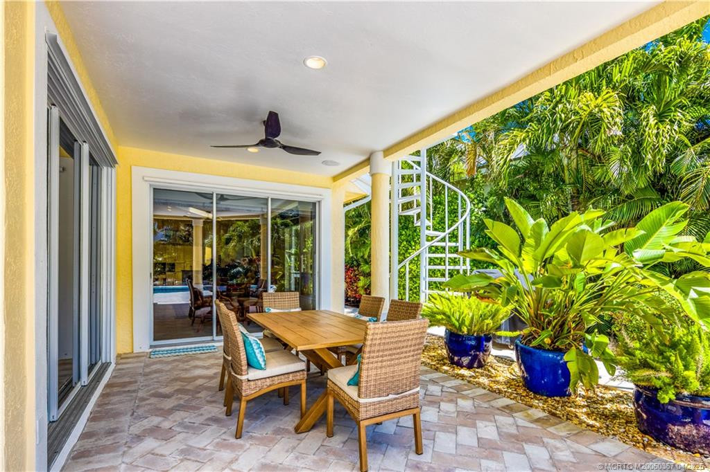 Covered area just off family and living rooms