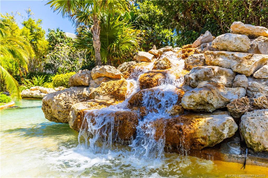 Waterfall connected to winding river