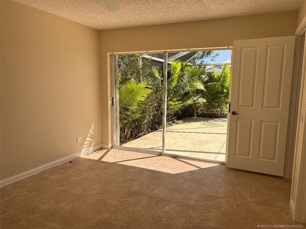 Master bedroom looks onto the lanai