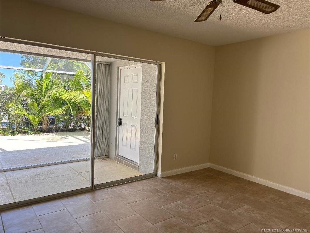 Guest bedroom looks onto the lanai