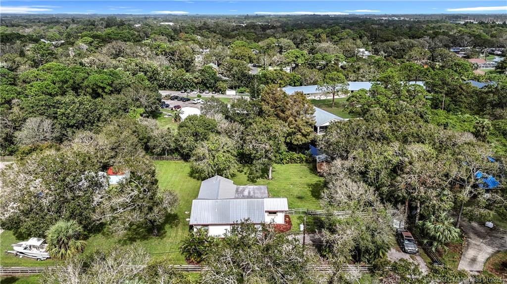 The property goes all the way over to where the boat is on the left side 175x145.22. The shed is in the right side in rear. Circular drieway. Fenced yard. Metal roof, CBS Block home. All renovated 2013. This is a must see.