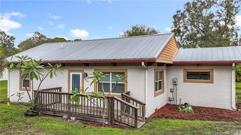 This home opens up to a beauty.