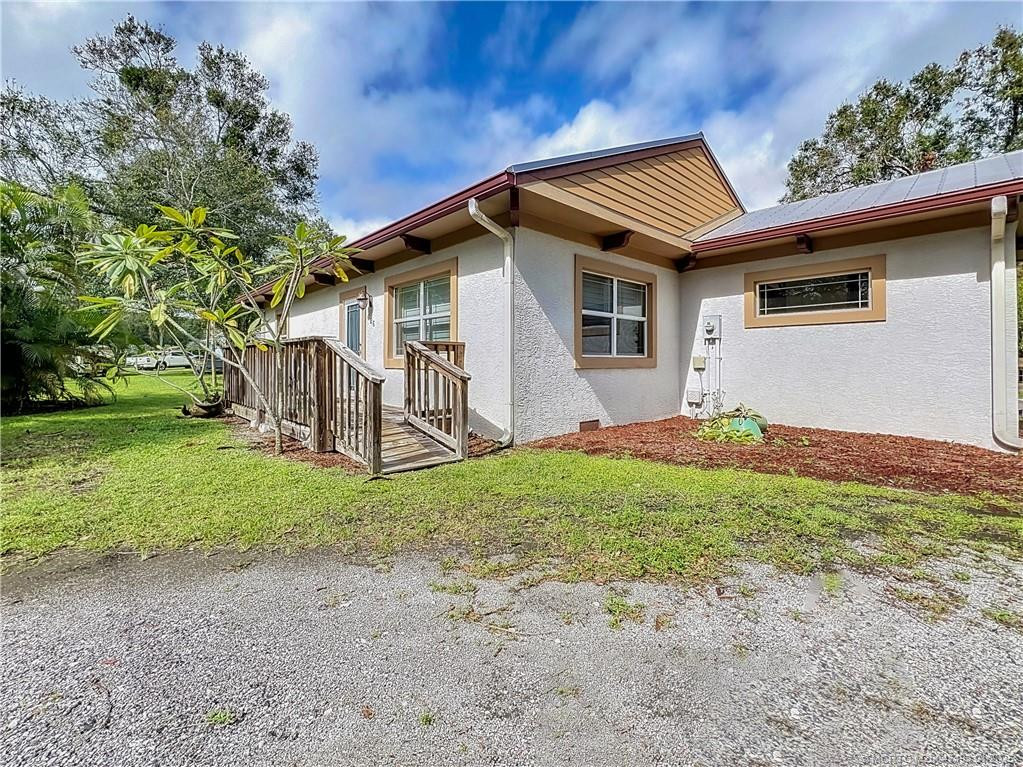 Circular driveway, to get in and out easily. This front door opens into a beauty. All updated.