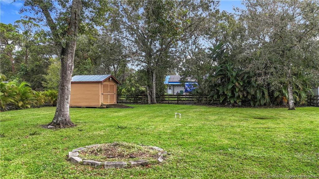 With a shed for extra storage.