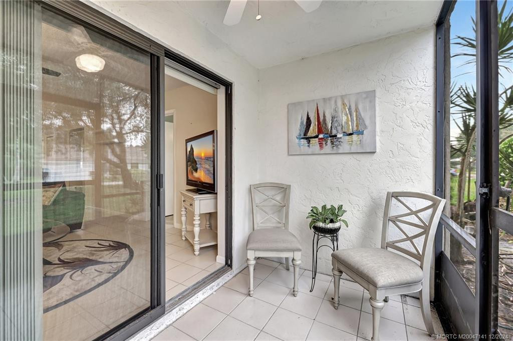 The living room flows to the patio space.