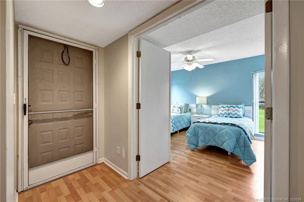 Front enrty way and guest bedroom.