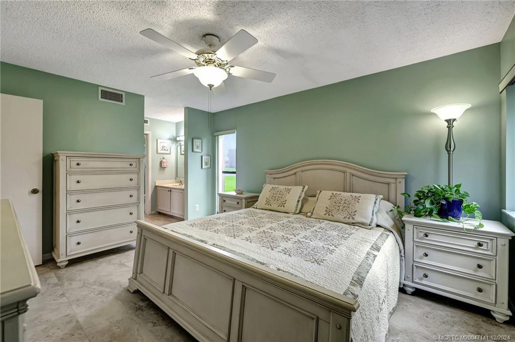 Primary Bedroom with king size bed.