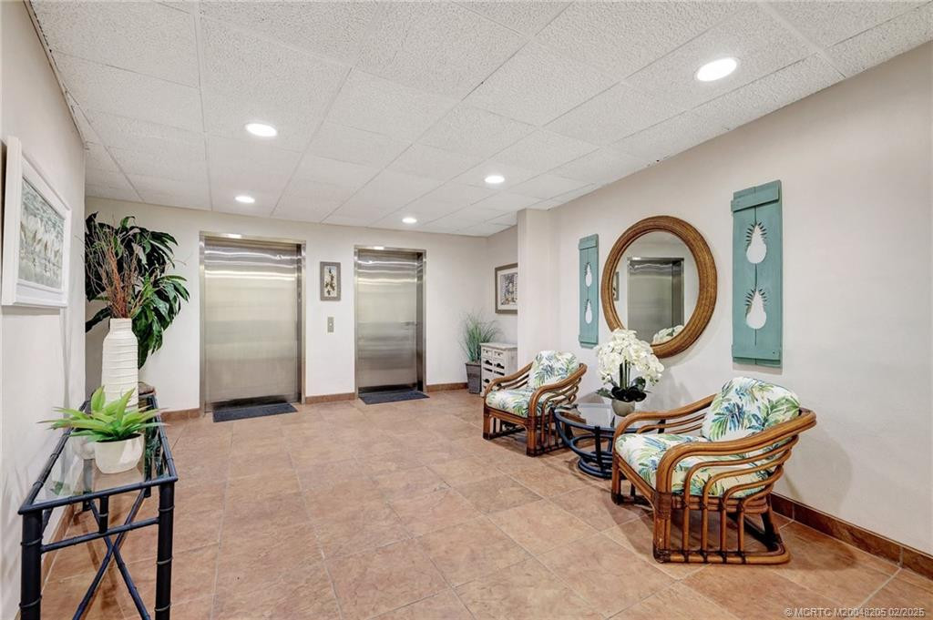 Lower Lobby with elevators & storage area