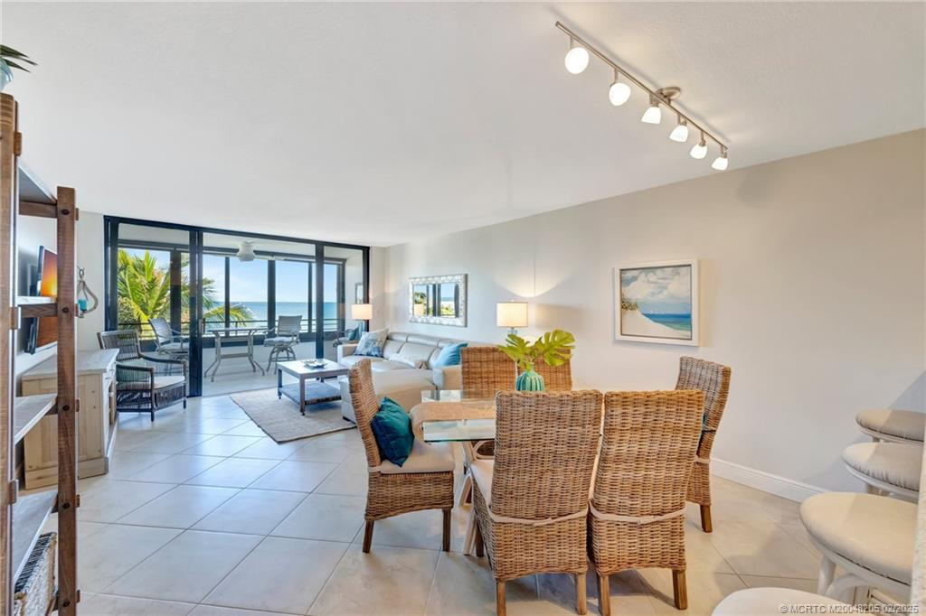 Great Room with dining area and balcony