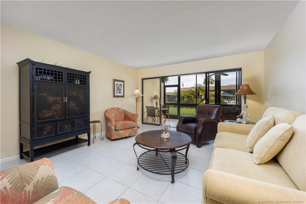 Slider from great room to screened lanai.