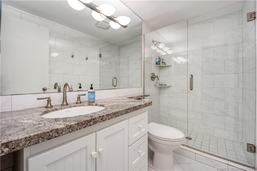Guest bath also updated with granite vanity and new shower.