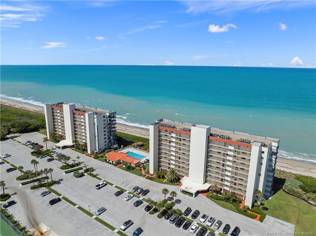 This is the BACK of the building as you are looking at waterfront. Sea turtles nest on these beaches every spring and the hatchlings dig their way out and high tail it to the water for their safety.