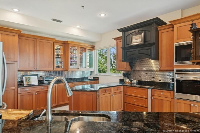 Custom Cabinetry and Blue Pearl Granite....