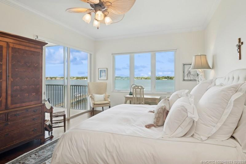 Primary Suite with Sliders and Electric Shades