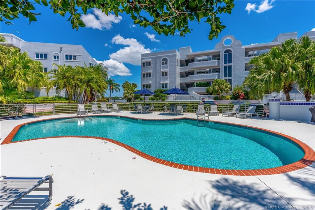 Poolside under the Palms in this Boutique Community...