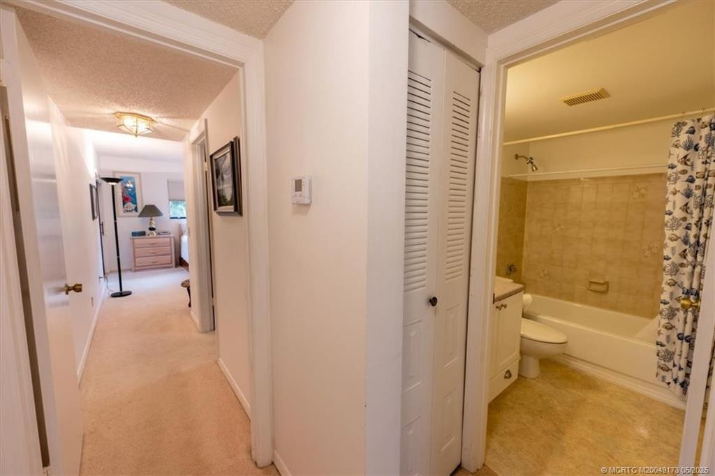 Hallway from Dining Room to Guest Bathroom to Master Bedroom