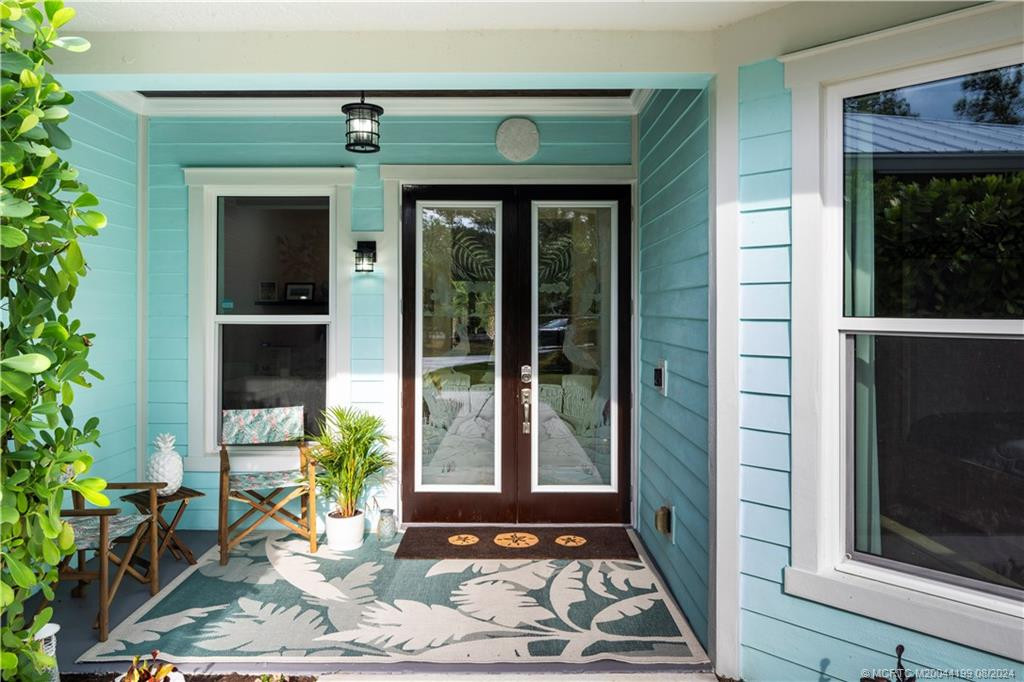 Custom Entry perfect for the morning sun. All impact windows and doors.
