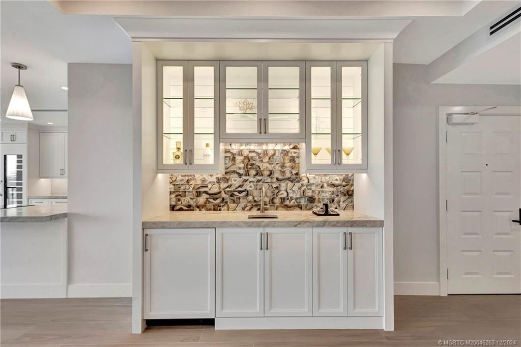 Entertainment area with sink and Uline beverage cooler