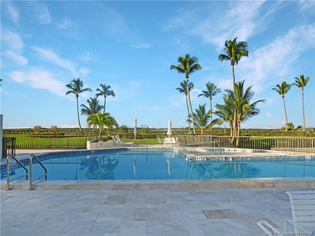 Beautiful condo pool with jacuzzi redone summer 2024