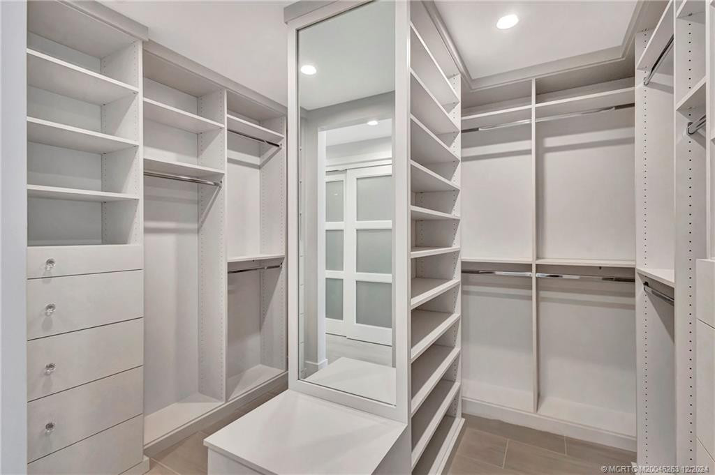 Thoughtfully designed custom closet in primary suite