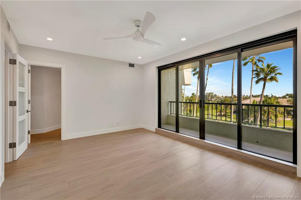 Guest bedroom with private balcony and ensuite bathroom