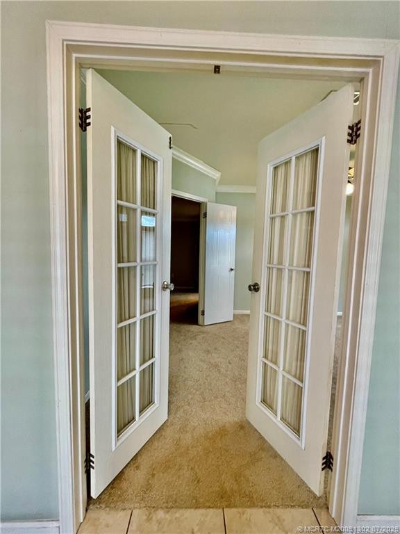 French doors to bonus room