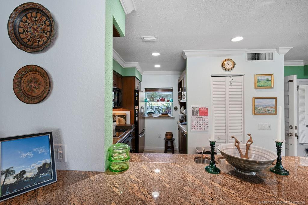 Looking into kitchen from bar