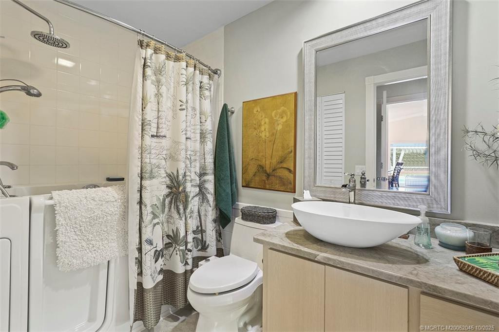 The Guest Bath has a walk-in hydro spa tub
