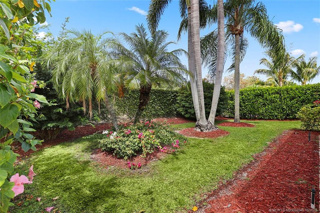with lush, mature landscaping
