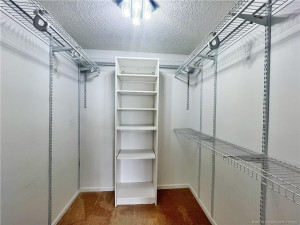 Primary Bedroom's walk-in closet.