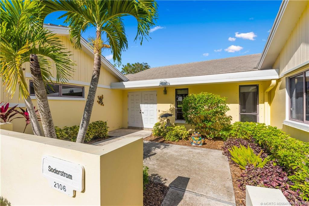 Front Courtyard at 2106 NW Greenbriar Lane, Palm City