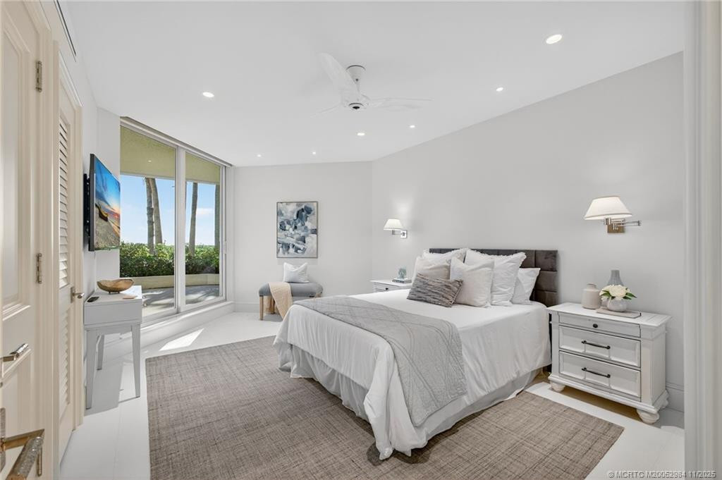 Bedroom 2 with sliders to the east facing balcony