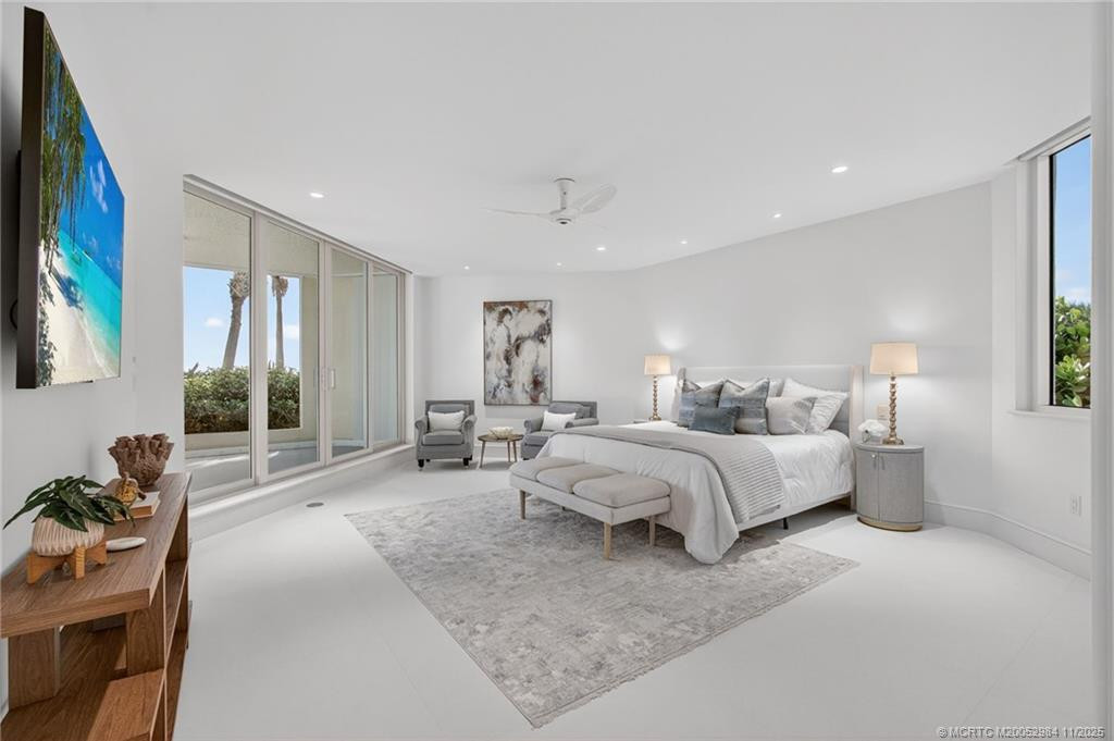 Spacious suite with motorized shades