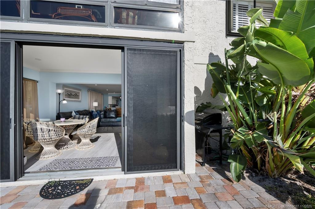 Brick paver walkway outside Sun room