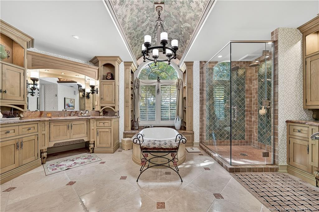 Primary Bath - Heated Floor - Custom Cabinetry - Finishes that only a private showing can appreciate!