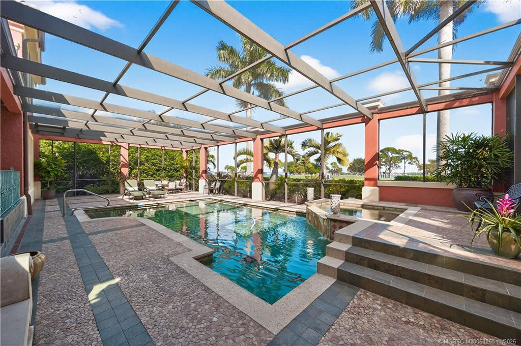Large Screen-Enclosed Pool and Patio with Spa