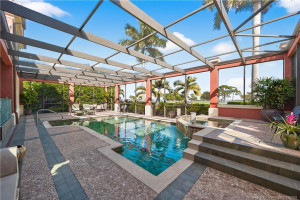 Large Screen-Enclosed Pool and Patio with Spa