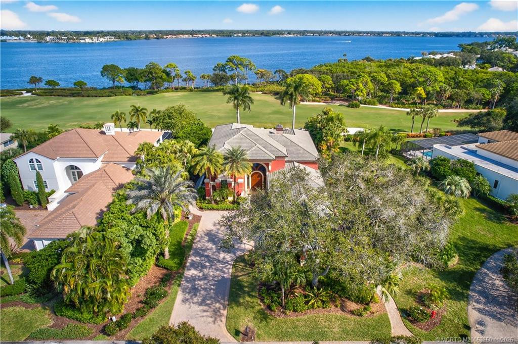 Areial view of home with Golf Course and River views.